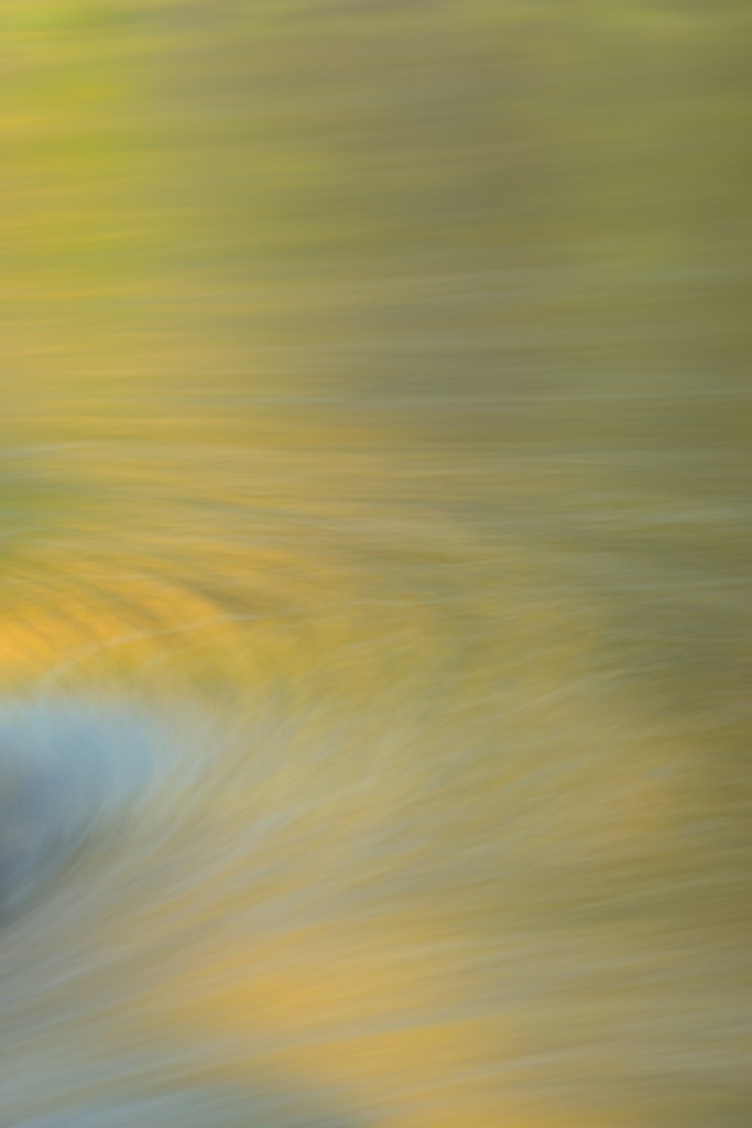 Reflections of the afternoon sun on the Merced River