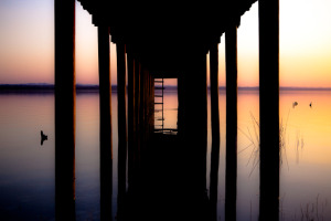 Pier in El Remate, Guatemala at Sunset