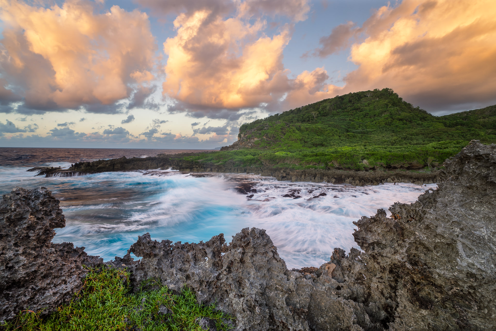 Sunrise over the limestone rocks above Lily Beach on Christmas Island