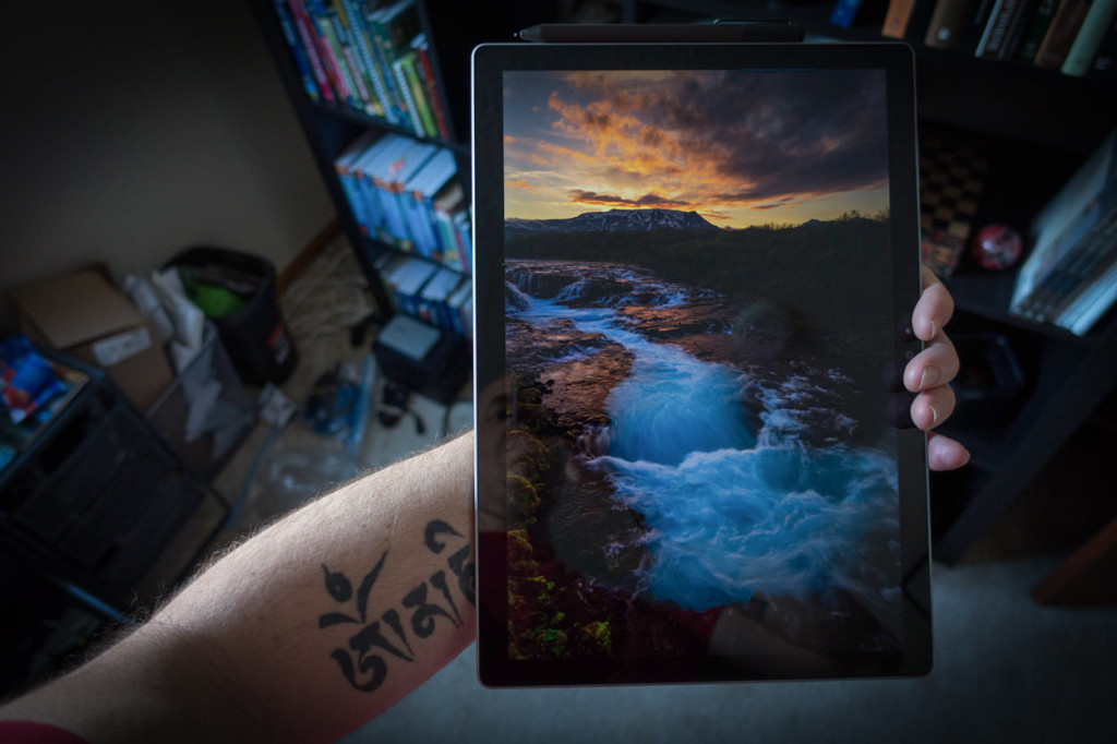 Holding the Surface Book screen in one hand