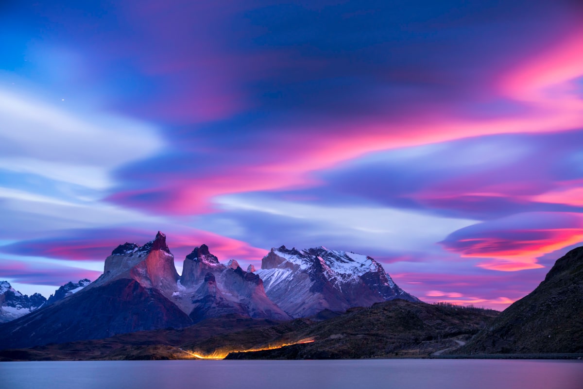 A beautiful sunrise over the Torres del Paine National Park in Chile with Colby Brown's Patagonia Photography Workshop Adventure