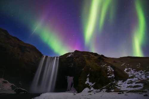 Aurora Over Skogafoss in South Iceland from Colby Brown's Iceland Winter Photo Workshop