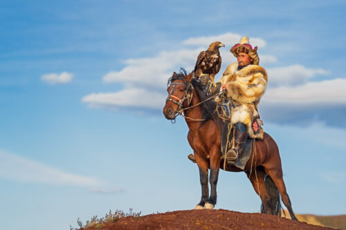 Eagle Hunter Looking Out Over His Valley - Mongolia Photo Workshop Adventure with Colby Brown