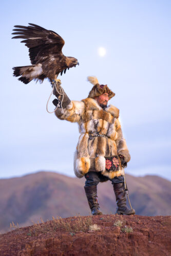 Eagle Hunter holding a Golden Eagle, Mongolian Photo Workshop Adventure with Colby Brown
