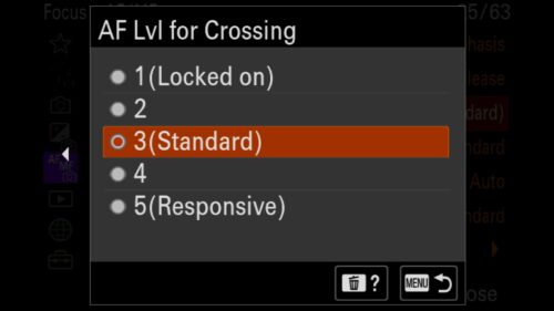 AF Level for Crossing - Adjust the sensitivity for when something crosses in front of the subject you are tracking. Your options: 1 (Locked On), 2, 3 (Standard/Default), 4 or 5 (Responsive). Adjust this setting depending on the subject you are trying to photograph. For example, when I know I am trying to photograph a specific bird flying, I will use either 2 or 1 so my AF system feels more "sticky." and sticks with my target subject more aggressively.